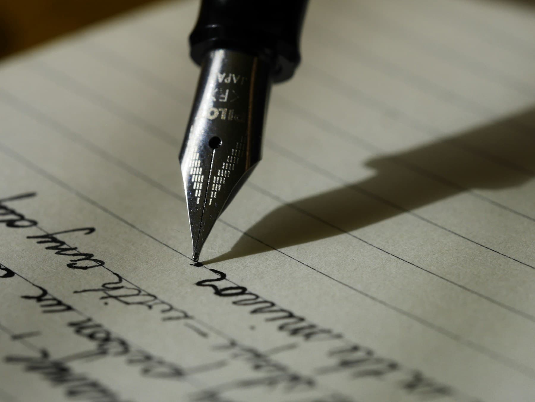 A fountain pen signing an important document